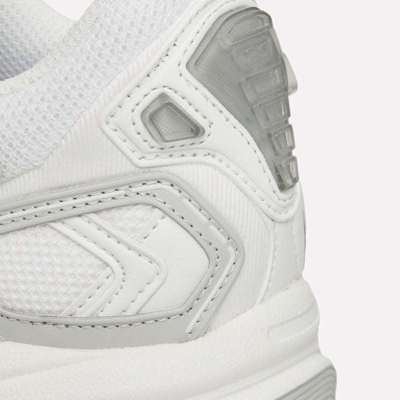 Close-up of the heel and side of the Reebok Premier Road Ultra, a white archival running sneaker with mesh and textured synthetics, gray accents, visible stitching, and a supportive dual-density midsole.